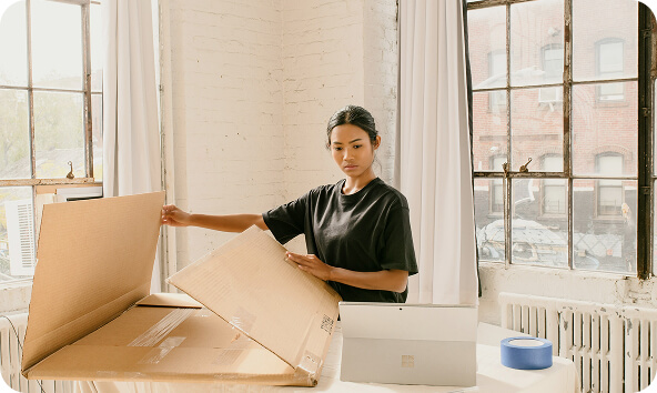 portrait-young-woman-digital-nomad-standing-office-with-laptop-smiling-working-her (2) (1)